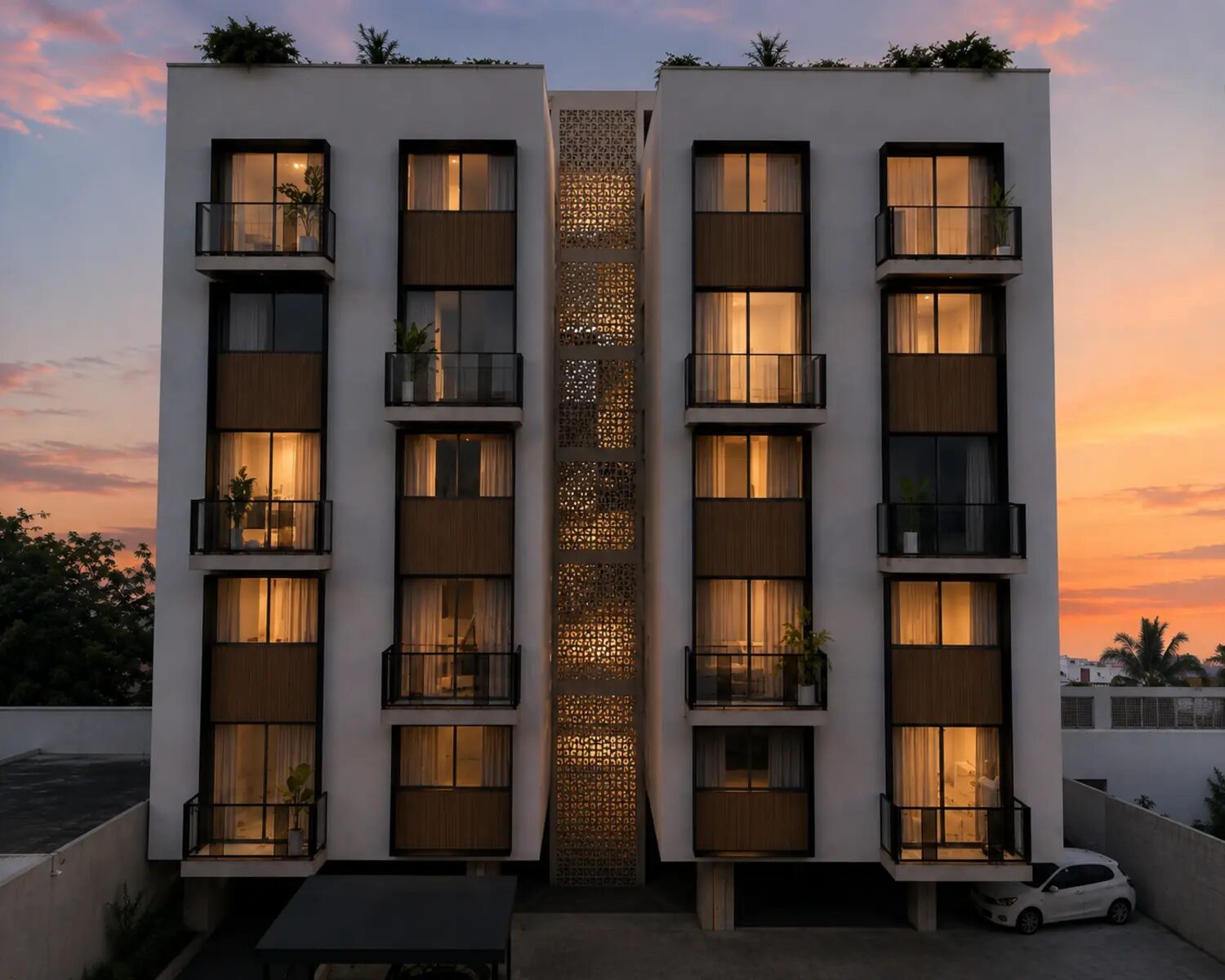 Fachada principal de DUO Living con celosía iluminada